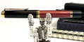 pelikan_souveran_m800_black_red_fountain_pen_with_skeleton_pen_holder_closeup