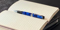 Aurora_optima_auroloide_blue_chrome_rollerball_pen_uncapped