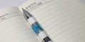 monteverde_regatta_santorini_blue_ballpoint_pen_in_notebook