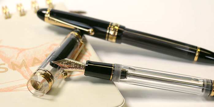 pilot_custom_823_clear_fountain_pen_uncapped_with_smoke