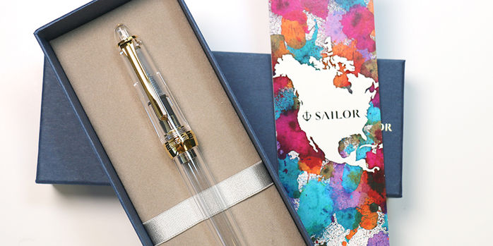 sailor_1911_large_clear_fountain_pen_on_pen_box