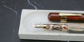 taccia_covenant_se_parchment_swirl_and_persimmon_winds_up_close