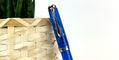 pelikan_vibrant_blue_rollerball_pen_leaning