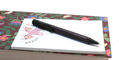 lamy_safari_scarlet_ballpoint_pen_on_notebook