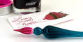 j_herbin_spiral_glass_dip_pen_with_lamy_crystal_rhodonite_ink