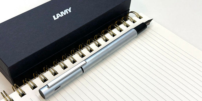 lamy_pur_silver_fountain_pen_posted_on_lined_paper