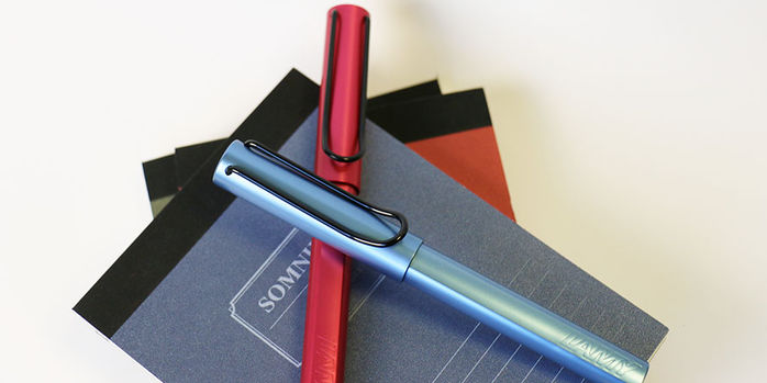 lamy_2024_special_edition_al_star_fiery_and_aquatic_rollerball_pens_stacked