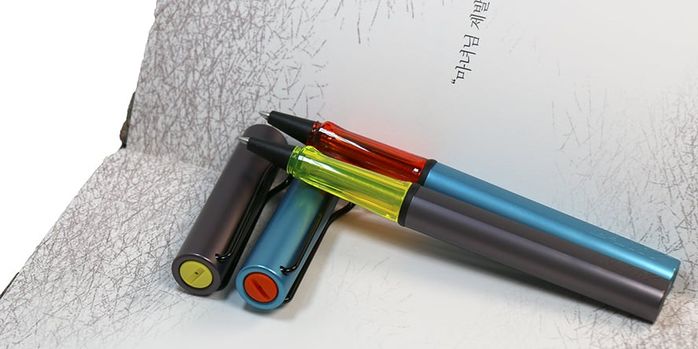 lamy_2025_special_edition_al_star_denim_and_aubergine_rollerball_pens
