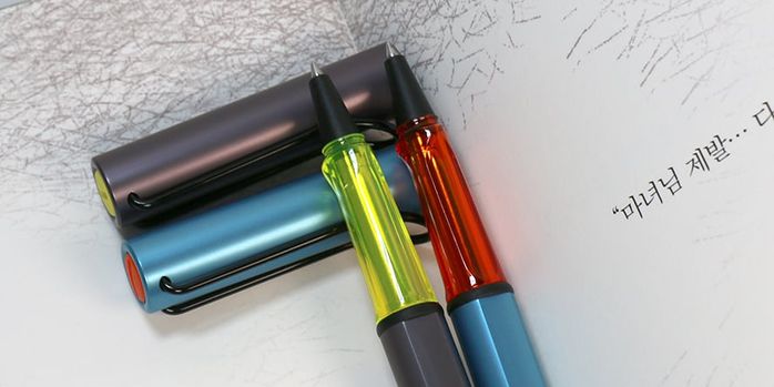 lamy_2025_special_edition_al_star_denim_and_aubergine_rollerballs_uncapped