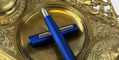 lamy_aion_fountain_pen_dark_blue_gold_antique_inkwell_in_background