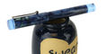 opus_88_koloro_demonstrator_sapphire_fountain_pen_on_swear_words_jar