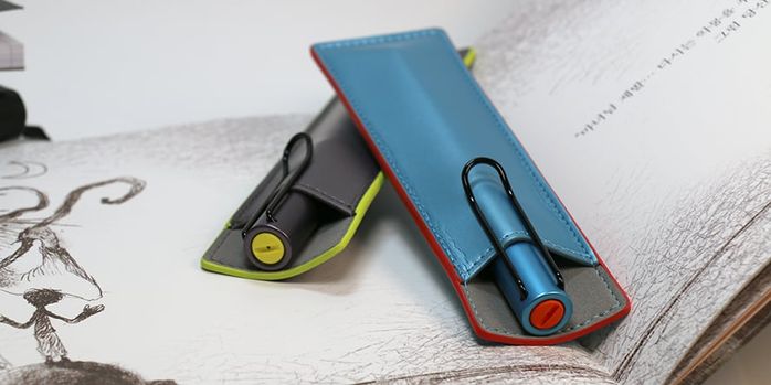 lamy_2025_special_edition_al_star_denim_and_aubergine_fountain_pens_capped_with_leather_pouches