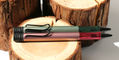 lamy_2024_special_edition_al_star_autumn_pink_and_sage_ballpoint_pens_on_wood