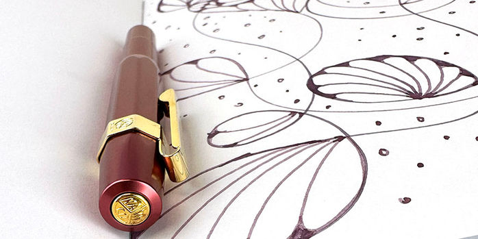 kaweco_al_sport_special_edition_ruby_red_fountain_pen_finial_and_doodle_page