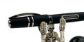 visconti_homo_sapiens_skylight_steel_age_fountain_pen_on_skeleton_pen_holder