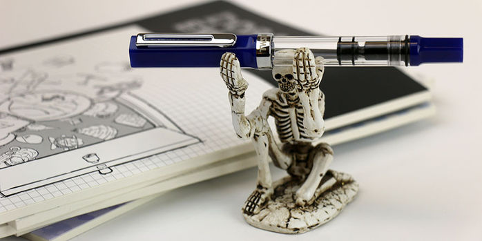twsbi_eco_dark_sapphire_fountain_pen_with_skeleton_pen_holder