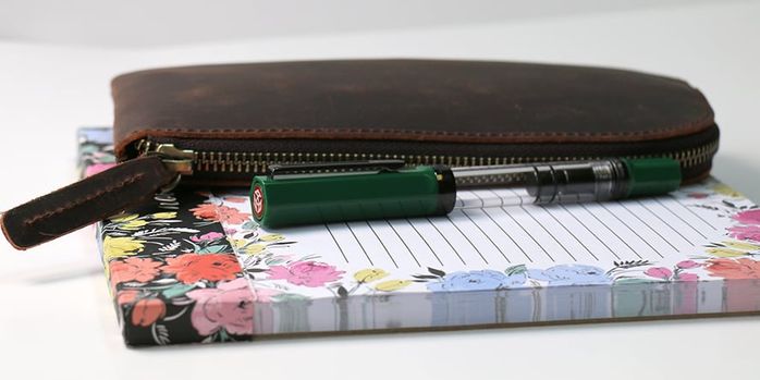 twsbi_eco_irish_green_fountain_pen_capped_on_notebook