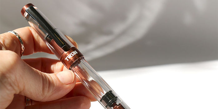 twsbi_diamone_580_alr_affogato_with_onyx_fountain_pens_in_hand