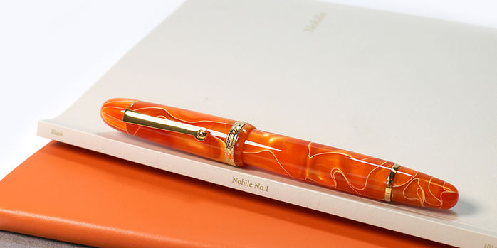 penlux_masterpiece_grande_orange_swirl_fountain_pen_capped