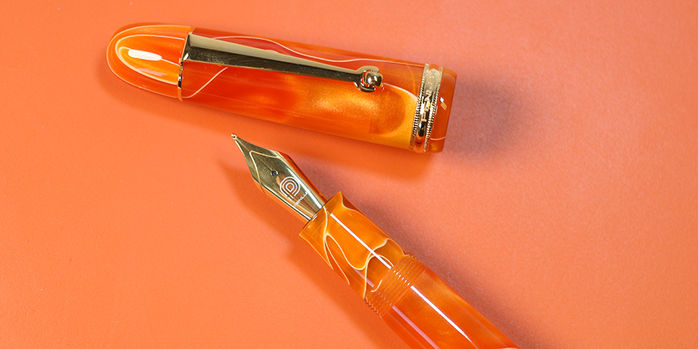 penlux_masterpiece_grande_orange_swirl_fountain_pen_uncapped