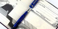 opus_88_jazz_transparent_blue_fountain_pen_uncapped_in_hero_journal