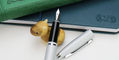 cross_calais_fountain_pen_satin_chrome_uncapped_on_pen_rest