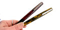 tibaldi_infrangibile_all_chrome_yellow_and_all_mauve_red_fountain_pens_in_hand