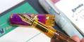 benu_talisman_ametrine_fountain_pen_in_hand