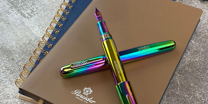 https://images.penchalet.com/products/additional/12922_conklin_all_american_limited_edition_rainbow_fountain_pen_posted.jpg?tr=w-698,h-349