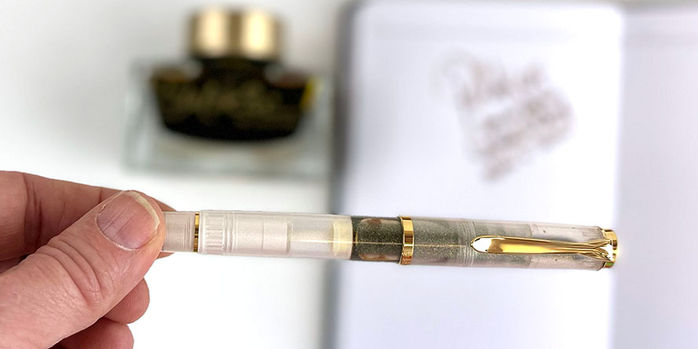 pelikan_m200_golden_beryl_ink_and_fountain_pen_special_edition_in_hand