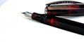 visconti_medici_astral_stellar_red_fountain_pen_closeup_uncapped
