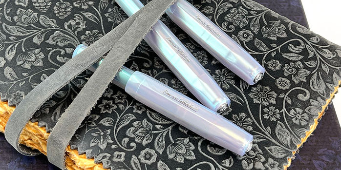kaweco_collector's_edition_iridescent_pearl_fountain_pen_on_handmade_journal