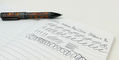 endura_deco_crest_ballpoint_pen_writing_sample_on_notebook