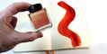 Wearingeul_world_lit_siddhartha_ink_bottle_in_hand_above_ink_swatch