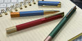 ystudio_glamour_evolve_bihex_rollerball_pens_blue_uncapped