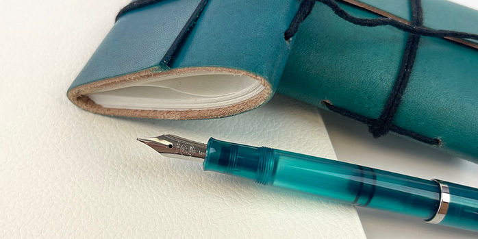 pelikan_classic_205_apatite_special_edition_fountain_pen_uncapped_by_notebooks