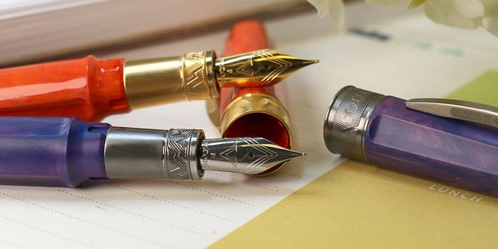 visconti_mirage_mythos_collection_fountain_pens_demeter_and_persephone_uncapped_on_notebooks
