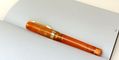 visconti_kaleido_fire_opal_fountain_pen_in_pineider_blues_notebook
