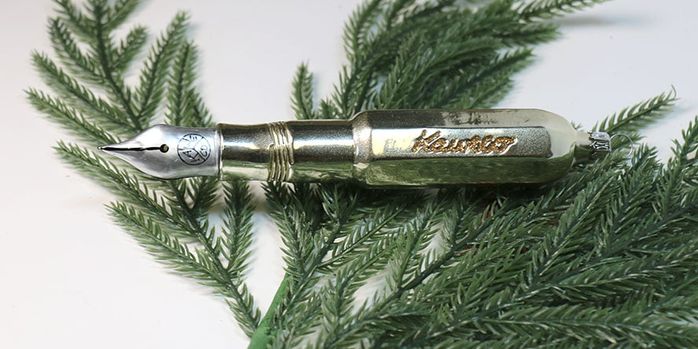 kaweco_blown_glass_fountain_pen_ornament_white_clear_2024_with_greenery