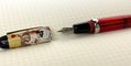 opus_88_2023_new_year_mini_pocket_fountain_pen_cheers_kitty_cap_closeup