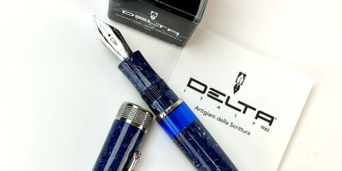 delta_lapis_blue_celluloid_limited_edition_188_fountain_pens_uncapped_by_brochure