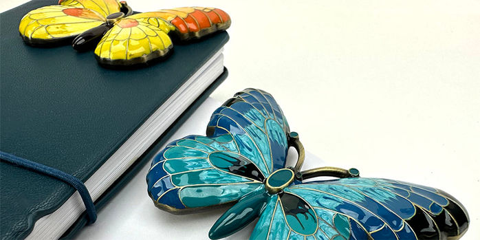 esterbrook_butterfly_page_holder_teal_and_yellow_on_notebook