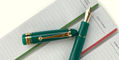 pilot_us_exclusive_custom_743_green_fountain_pen_on_notepad