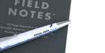 retro_51_pan_am_clipper_tornado_rollerball_pen_on_notebook