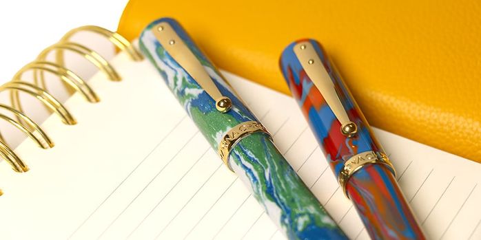magna_carta_mag_600_golden_gate_and_marbled_monument_pens_on_notebook