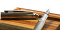 waldmann_pocket_lines_fountain_pen_uncapped_on_wood_stand