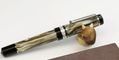 delta_montepetra_fountain_pens_uncapped_on_sea_monster_pen_holder