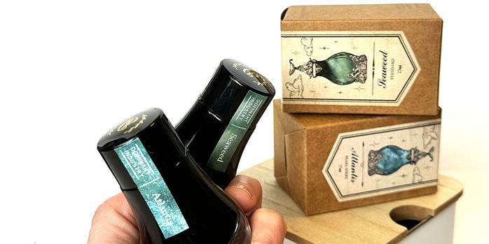 dominant_industry_archiving_25ml_ink_with_boxes_in_hand