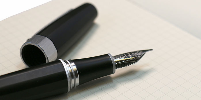 montegrappa_magnifica_open_edition_fountain_pen_uncapped_on_notebook