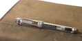 pineider_avatar_ur_mini_rollerball_pen_on_notebook